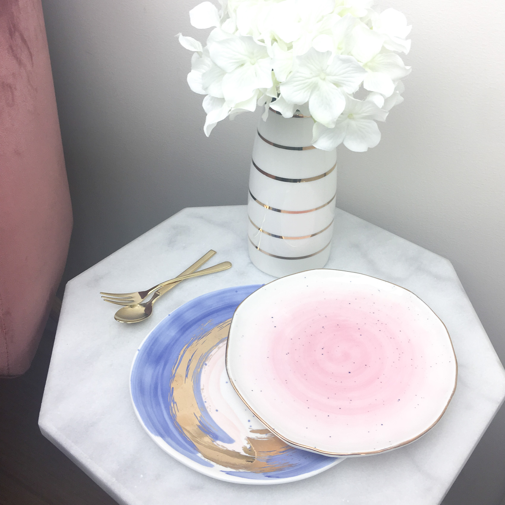 Anthropologie Mimira canape plate,gold cutlery, marble table.jpg